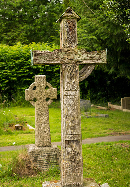 istock Old oak framed cross in graveyard in Stokesay in Shropshire, England 2228989196