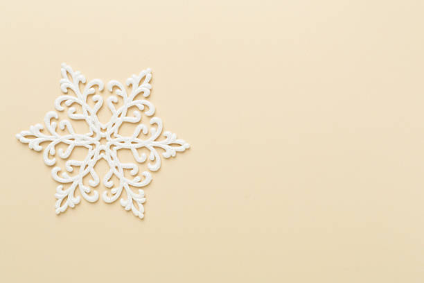 istock Beautiful snowflake on color background, top view 2228995457