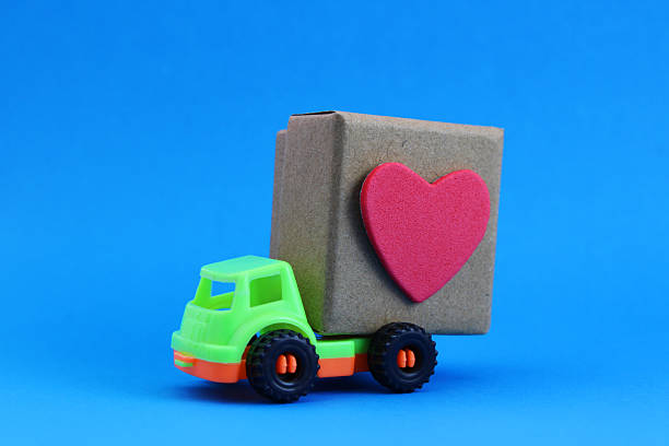 Truck delivers gift box with heart