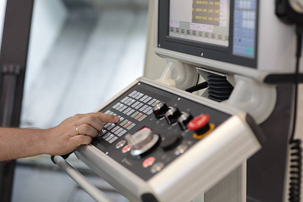 istock operator at the controls of metalworking machine 2229003099