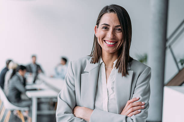istock Confident businesswoman and her team. 2229005977