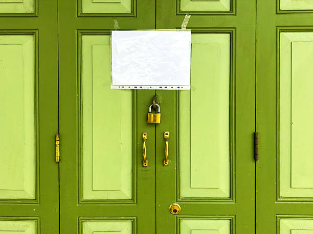 Blank paper sign attached on building exterior