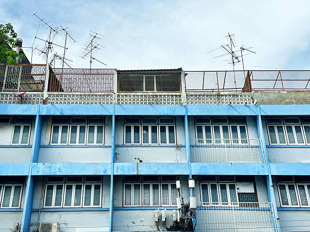 istock Apartment building exterior with antennas 2229007278
