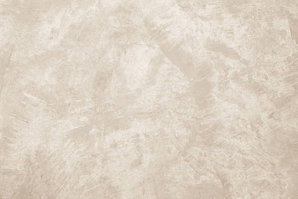 istock Concrete wall texture background. Close up retro plain cream color cement wall background texture. 2229010640