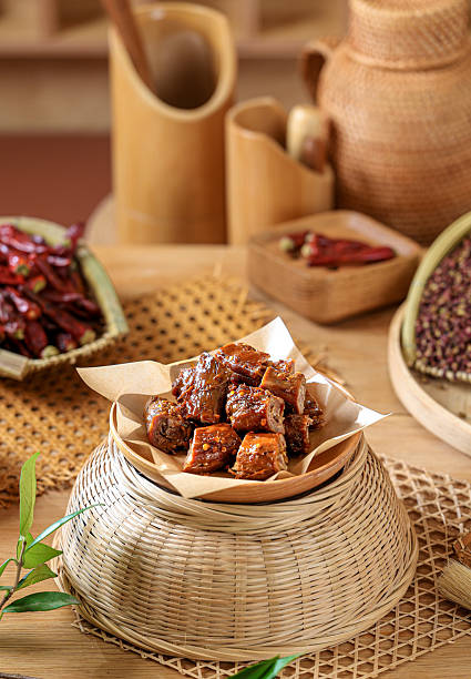Duck neck marinated with traditional five spices, kitchen interior scene photography Chinese cuisine