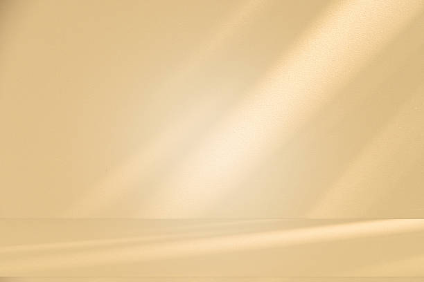 istock Studio style background wall decoration presentation uses white and beige tones. with shadows cast from a nearby window, concept creating a decorative 2229014359