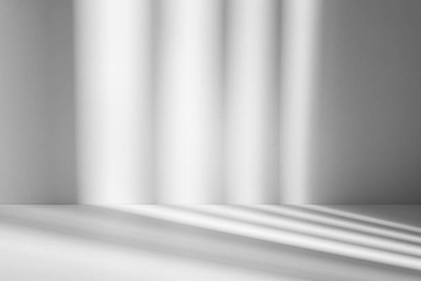 istock Wall interior background, studio and backdrops show products.with shadow from window color white . background for text insertion and presentation product 2229014455