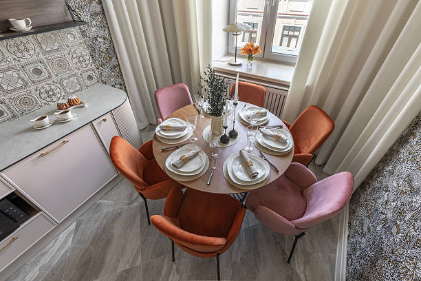 istock Top View of Stylish Kitchen Table Setting with Velvet Chairs 2229023574
