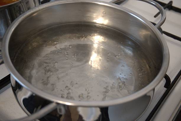 istock Boiling water in pot close-up 2229025717