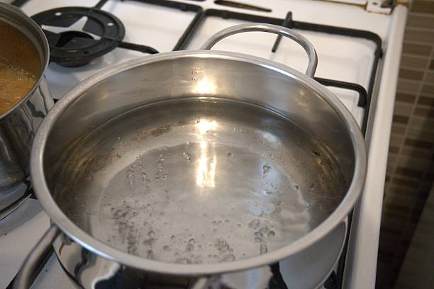 istock Boiling water in pot close-up 2229025730