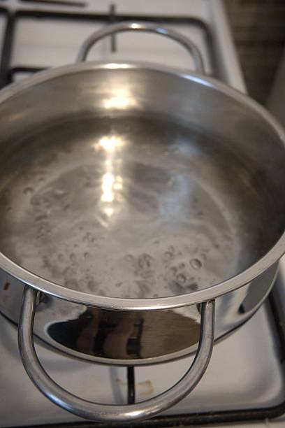 istock Boiling water in pot close-up 2229025745