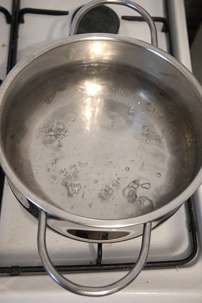 istock Boiling water in pot close-up 2229025751