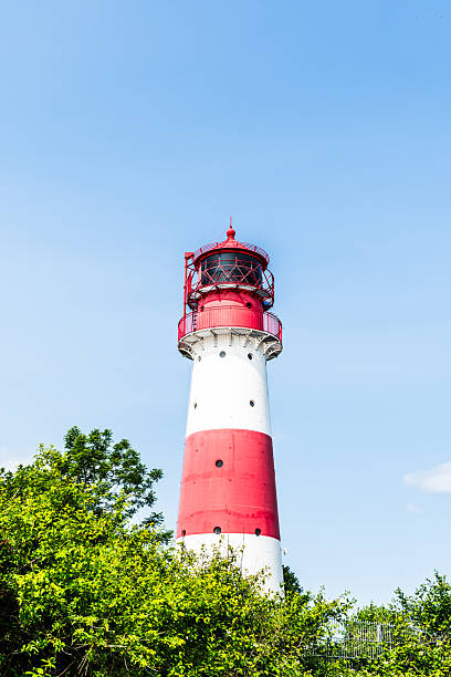 istock Red and white lighthouse Falshoeft in Schleswig-Holstein, Germany 2229032941