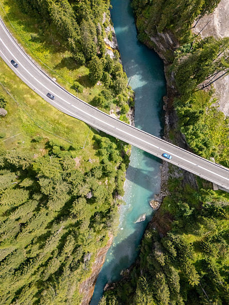 istock Aerial View of Bridge Over Mountain River 2229035700