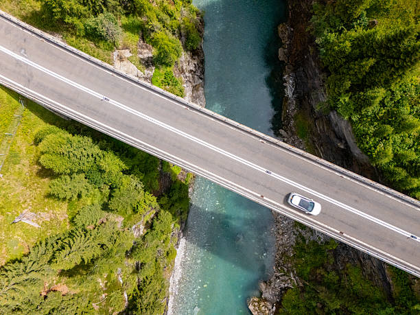 istock Aerial View of Bridge Over Mountain River 2229035847