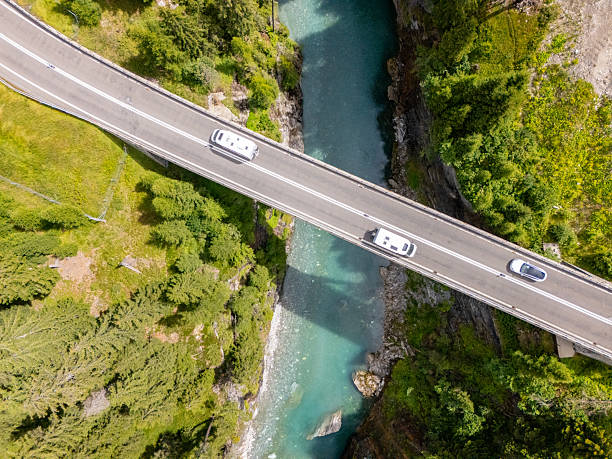 istock Aerial View of Bridge Over Mountain River 2229035893