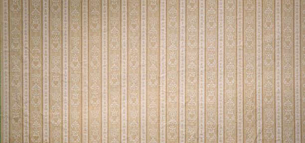 istock Old wallpaper on the wall. Old wallpaper for texture or background. 2229035895