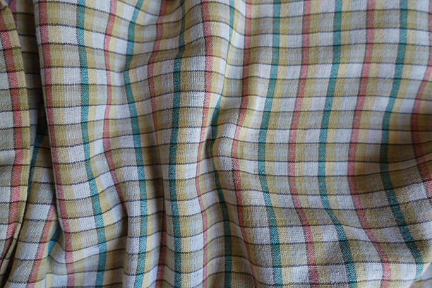 istock Rippled white, yellow, red and green checkered cotton fabric 2229036856