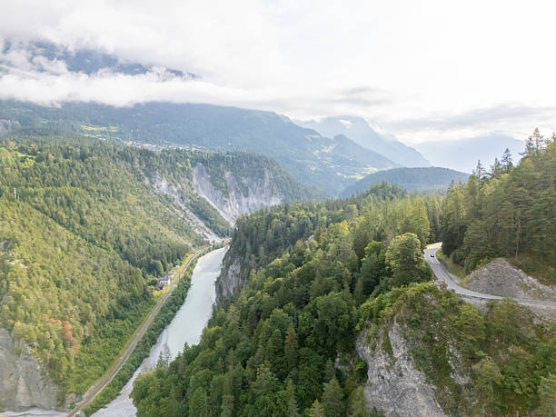 istock Aerial View of Mountain Road and River Bend 2229038046