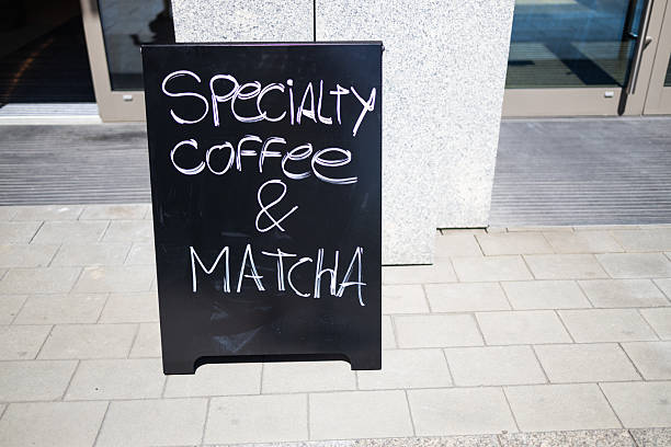 istock Chalkboard sign with Specialty Coffee and Matcha outside cafe 2229040510