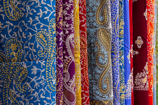 istock Colorful Traditional Fabric Display With Ornate Paisley and Floral Patterns 2229041577