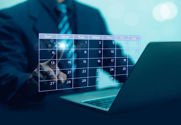 istock Business people use work schedules in business as a technological plan and project for proper planning and knowing the timeline of the work progress. 2229042086