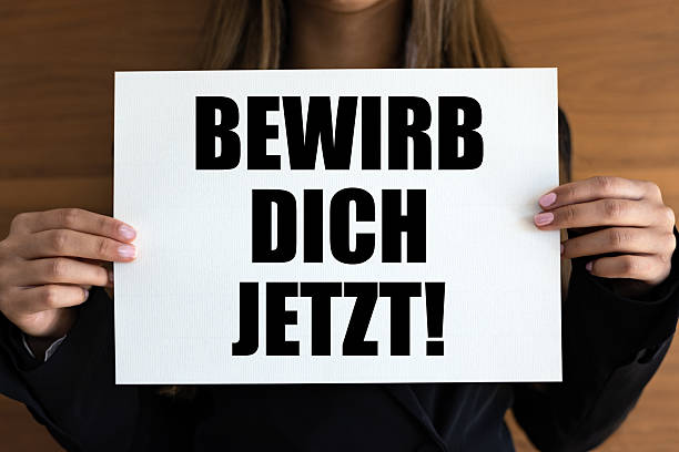 istock Apply now! (Apply now!), woman holds a message. 2229048147