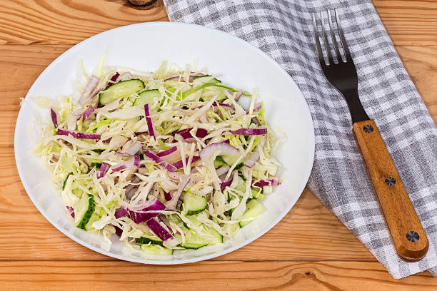 istock Serving of salad of sliced fresh vegetables on rustic table 2229052892