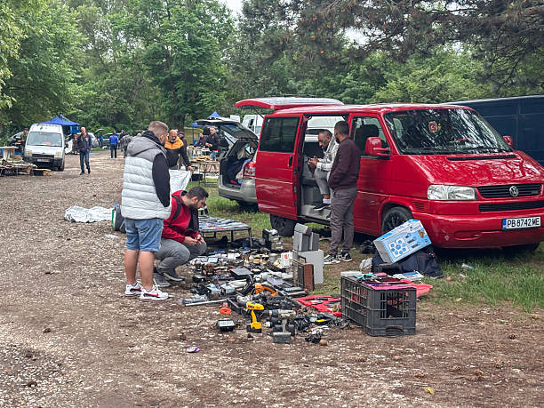Dimitrovgrad, Bulgaria - May 25, 2025; Located in southern Bulgaria near the Turkish border, the Dimitrovgrad  Flea Market is one of the largest and most vibrant open-air markets in the region. Held especially on Saturdays, it attracts visitors from both Bulgaria and Turkey. The market offers a wide range of products, from clothing and shoes to household items and electronics, all at affordable prices. With both local producers and importers selling their goods, the market is not only a shopping destination but also a lively space for cultural interaction.