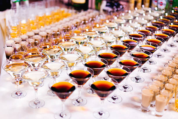 istock different types of glasses and alcoholic beverages on the table. 2229055438