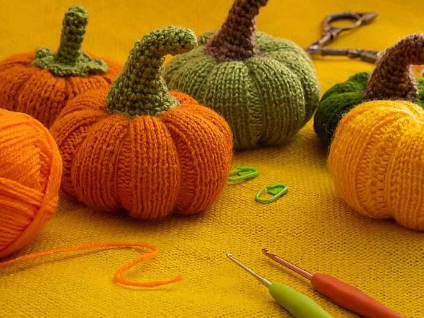 istock Handmade autumn crochet decor, pumpkins, leaves knitting tools. 2229056169