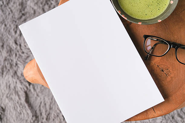 istock blank magazine mockup on coffee table with green matcha tea 2229057531