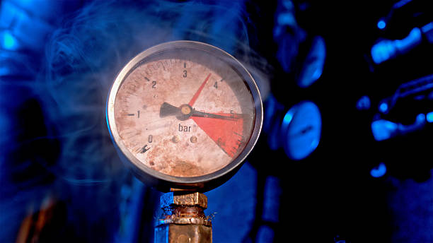 istock Rusty Industrial Pressure Gauge Against Smoky Blue Backdrop 2229063442