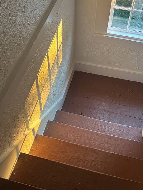 istock Summer morning sunlight through the stairway window 2229066390