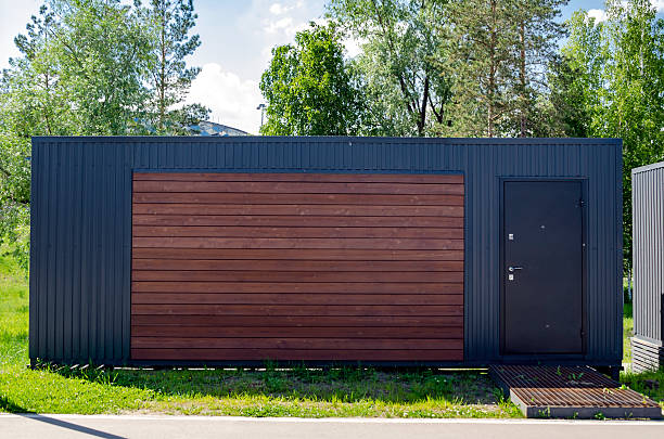 istock Modern Shipping Container Building with Wooden Door 2229074563