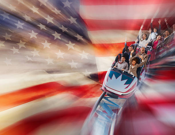 Vaughan, Ontario, Canada - July 26, 2014: People enjoying the summer time outdoors by spending time at Canada's Wonderland amusement park and riding the tallest and fastest roller coaster in Canada - the Leviathan. Taken in July 2014. 