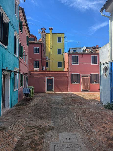 istock Quiet Courtyard with Colorful Houses in Burano 2229081547