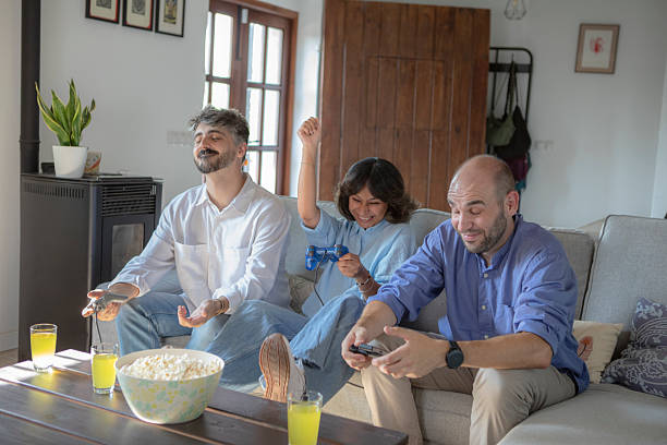 istock Friends Enjoying a Gaming Night at Home 2229083295