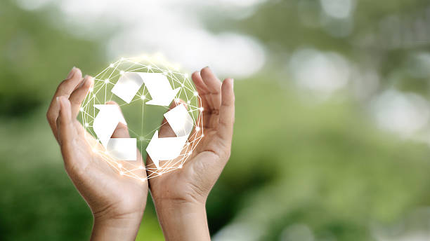 istock Recycling Symbol in Hand with Eco-Friendly Digital Network 2229084436