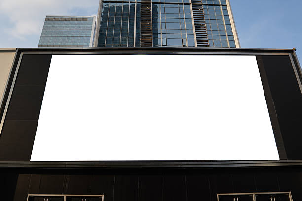 istock A mockup of a blank white billboard framed by a modern building facade, ideal for advertising 2229085363