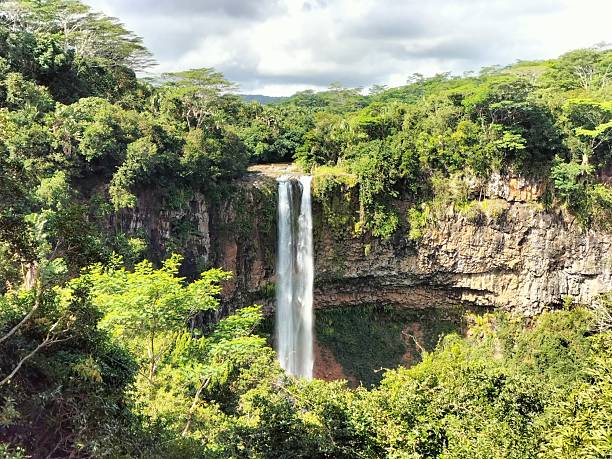 istock Views of Chamarel Waterfall in Mauritius on a partly cloudy day 2229087361