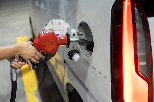 Refueling a car at a gas station