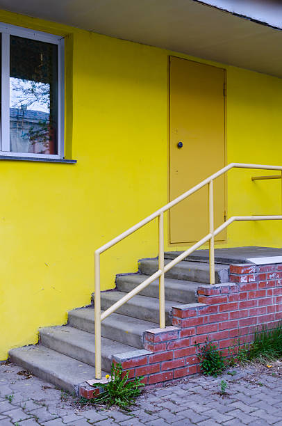 istock Yellow Building with Stairs and Doorway 2229090300