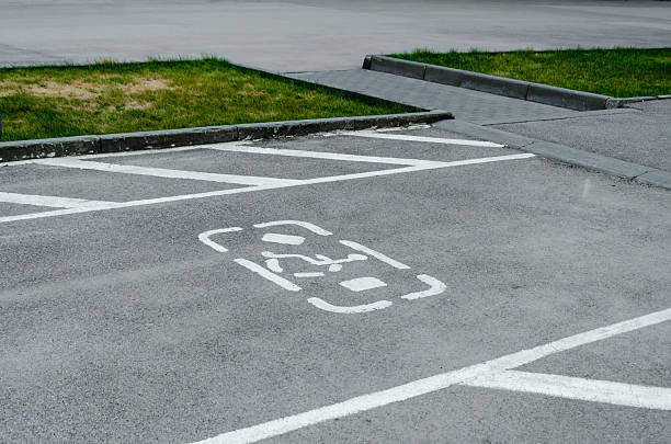 istock Disabled Parking Space Marking on Asphalt Road 2229090302