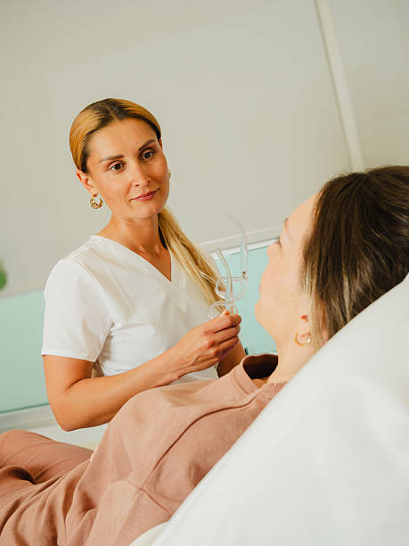 istock Woman Doctor with Patient 2229094243