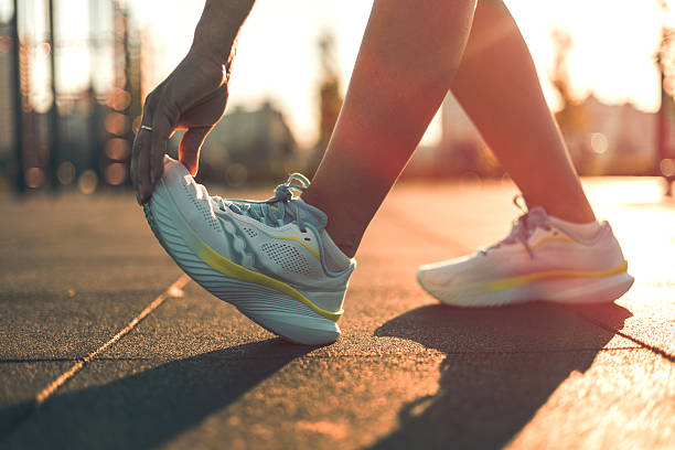 istock A sportswoman doing leg stretches 2229097479