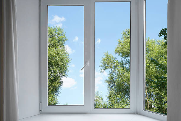 istock View from the window on the garden green trees. 2229098862