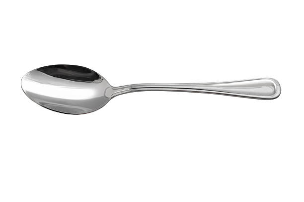 Sunlit Sugar on Spoon, White Background