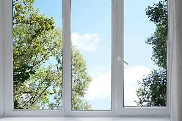 istock View from the window on the garden green trees. 2229110224
