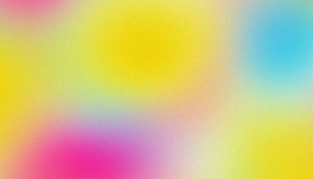 istock Colorful pink, yellow and turquoise gradient noisy grain background texture 2229114818